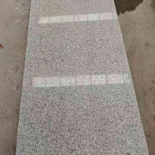 泰州芝麻白光面毛板